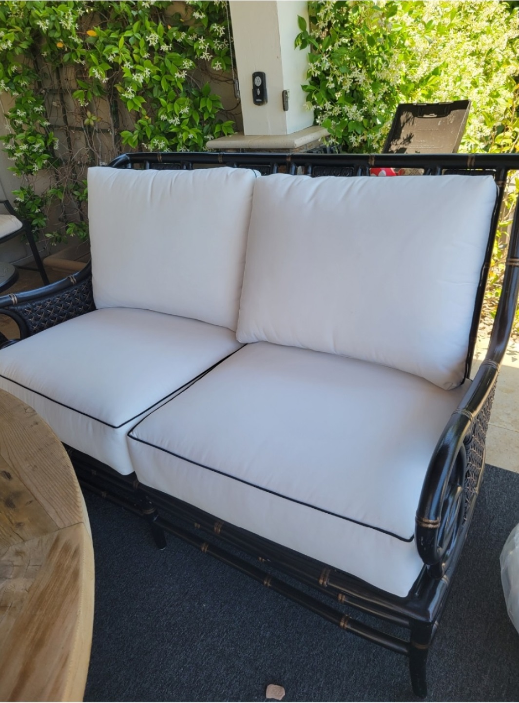 Outdoor Upholstery - White upholstered outdoor loveseat